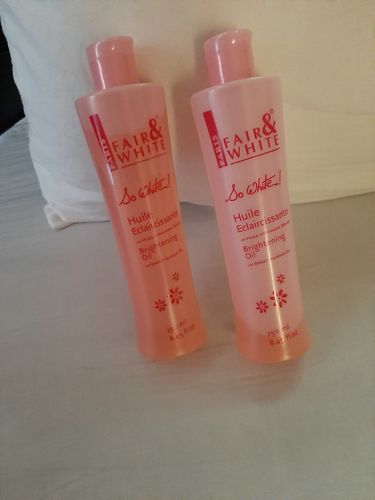 Customer photo review of Fair and White So White Brightening Body Oil with Sweet Almond Oil 250 ml / 8.4 fl oz