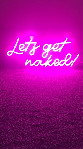 Customer photo review of 'Let's Get Naked' Neon Sign