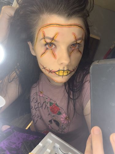 Customer photo review of Halloween contacts Get 3 random pairs with cases