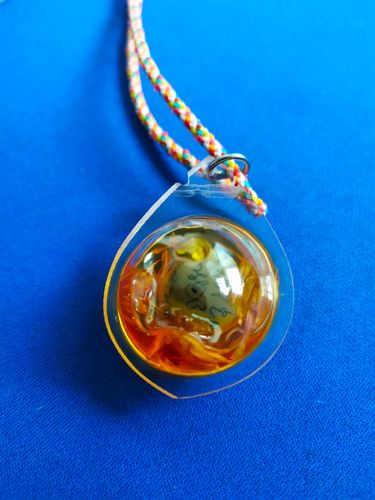 Customer photo review of Amulette de santé, de fortune et de charme Look Sawat Nam Wan Dok Thong.