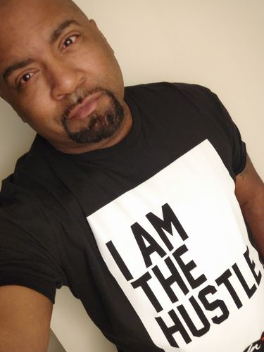 Customer photo review of I Am The Hustle Flag - Black Shirt