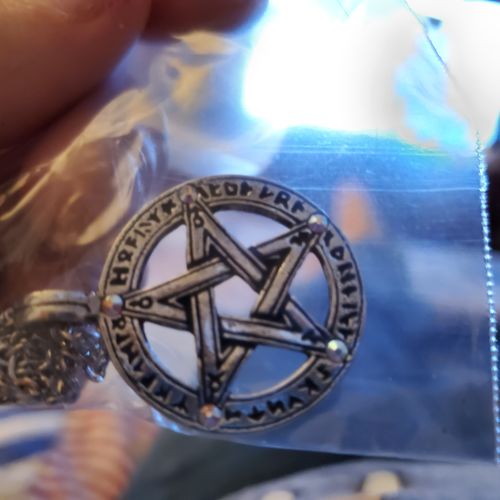 Customer photo review of Runes of Divination Necklace