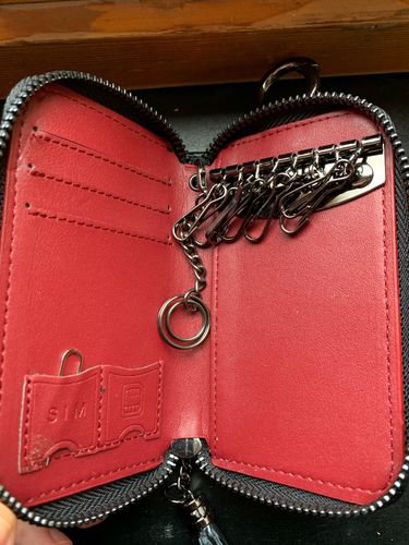 Customer photo review of Porte Clé Cuir Portefeuille Fleur