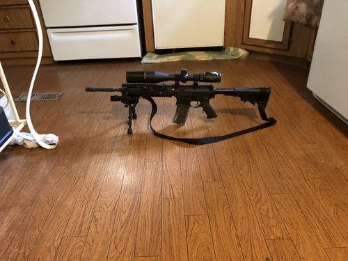 Customer photo review of SNIPER WKP 4-16X50 SAL Hunting Side Parallax Adjustment Glass Etched Reticle Red Green Illuminated with Bubble Level Rifle Scope