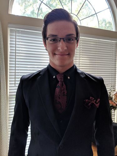 Customer photo review of Burgundy on Black Paisley Tie