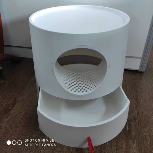 Customer photo review of Mayitwill XL Castle 2 in 1 Front-Entry Semi-Closed Cat Litter Box with Scoop