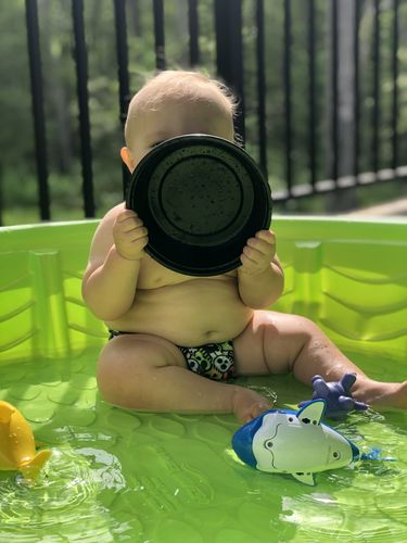 Customer photo review of Cheeky Cloth One Size Reusable Swim Diaper "Neon Skulls"