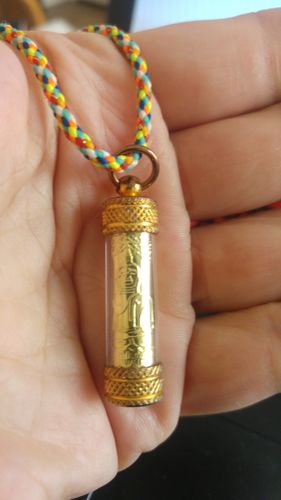 Customer photo review of Amulette Thaï Takut Mang-Mee-Sri-Suk de LP Tanjaï - Wat Phra Baromathat.