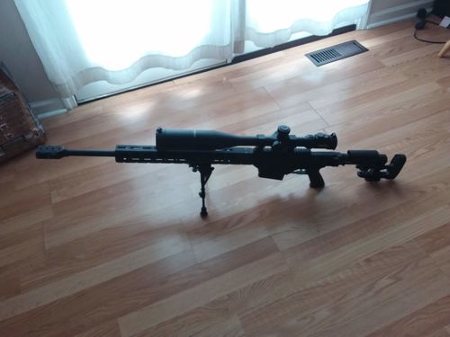 Customer photo review of Sniper KT 12-60X60 SAL Rifle Scope 35mm Tube Side Parallax Adjustment Glass Etched Reticle Red Green Illuminated with Scope Rings