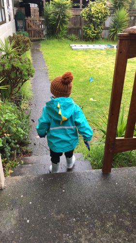 Customer photo review of Silly Billyz Aqua Dinosaur Waterproof Rain Jacket
