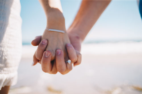 Customer photo review of 2.55 Carats Pear Shape Side Stones Hidden Halo Diamond Engagement Ring