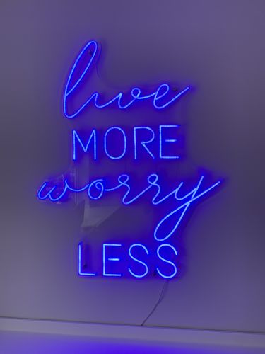 Customer photo review of 'live MORE worry LESS' Neon Sign