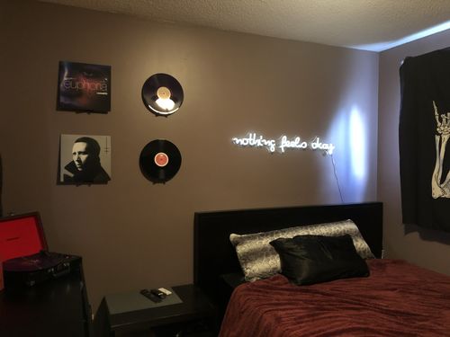 Customer photo review of 'Nothing Feels Okay' Neon Sign