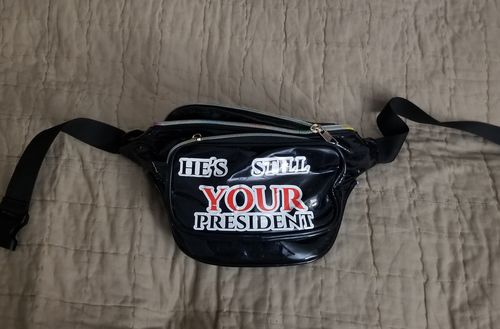 Customer photo review of He's Still Your President Stickers