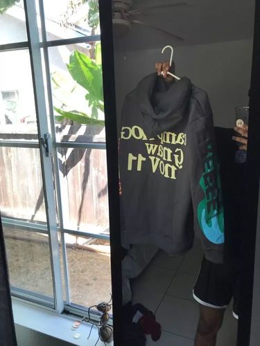 Customer photo review of "Lucky Me I See Ghosts" Hoodie