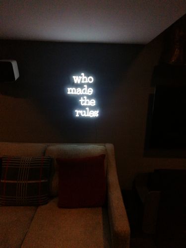Customer photo review of 'Who Made The Rules' Neon Sign