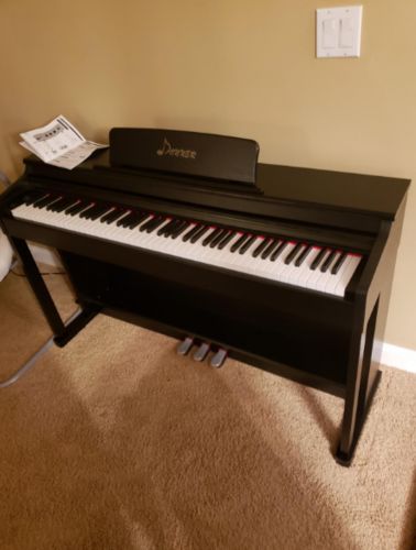 Customer photo review of Donner Home Digital Piano 88 Keys, Piano Keyboard Bundle with Furniture Stand Triple Pedals for Beginners Hobbyists, DDP-100 Black
