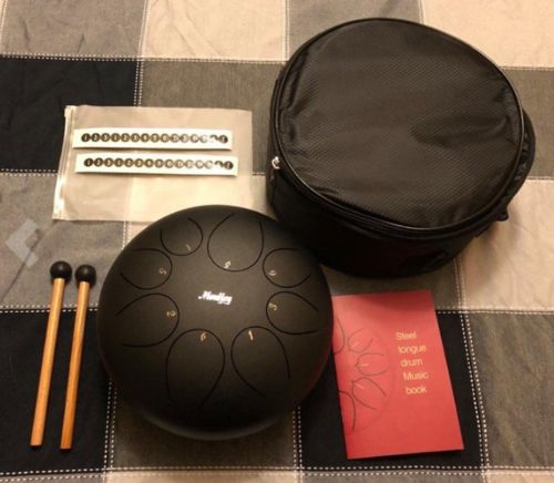 Customer photo review of Moukey Steel Tongue Drum 10 Inch Hand Pan Drum 8 Notes Tank Drum Percussion Instrument with Padded Travel Bag