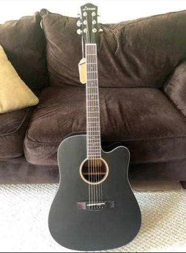 Customer photo review of Donner Acoustic Guitar Full Size, Cutaway Guitar Package 41 inch for Beginner with Gig Bag Tuner Capo Picks Strap Strings (Black, DAG-1CB)