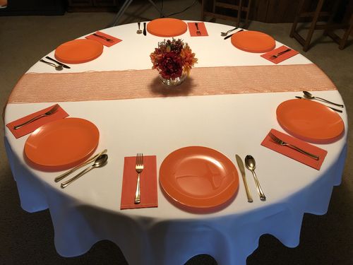 Customer photo review of Orange • Gold Round Plastic Plates | 10 Pack