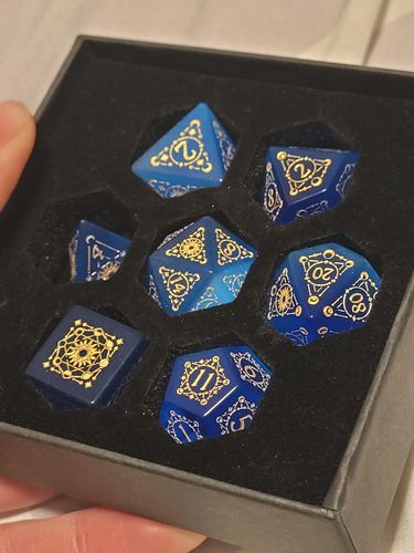 Customer photo review of Blue Cat's Eye Dice Set Gemstone DnD Dice Set Astrology Motif