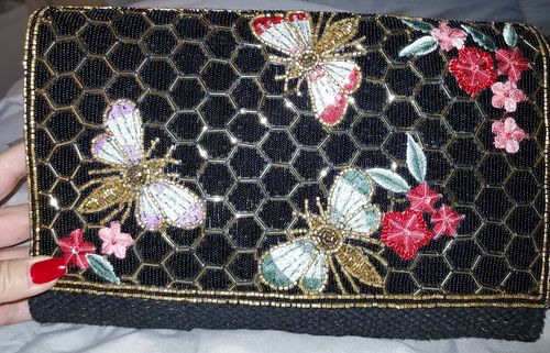 Customer photo review of Midnight Black Honey Bee Clutch