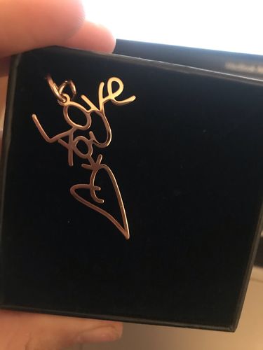 Customer photo review of LOANYA Children's Drawing As A Necklace Or Pendant