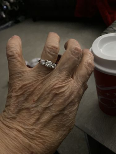 Customer photo review of Classic Three Stone Round Cut Moissanite Sterling Silver Wedding Ring