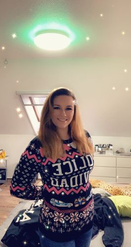Customer photo review of Pink Police Navidad Xmas Sweater