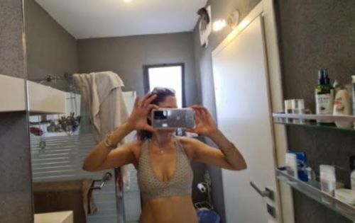 Customer photo review of GYMKARTEL® SUPPORTIVE SPORTS BRA - GRAY