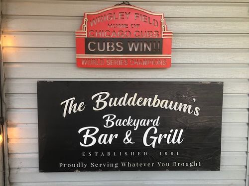 Customer photo review of Backyard Bar & Grill Sign