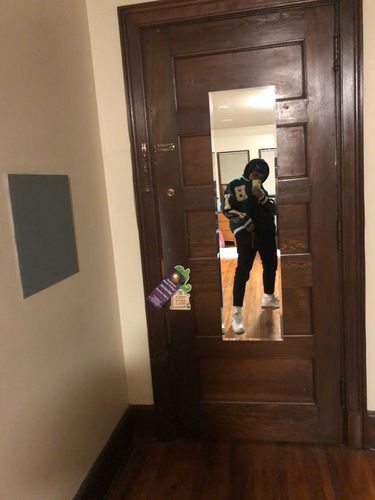 Customer photo review of "Blessed" Varsity Jacket