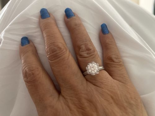Customer photo review of Moissanite four prong hand flower sterling silver wedding ring