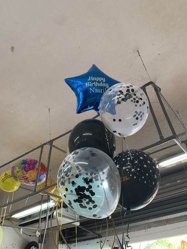 Customer photo review of Star Confetti On Clear Bouquet