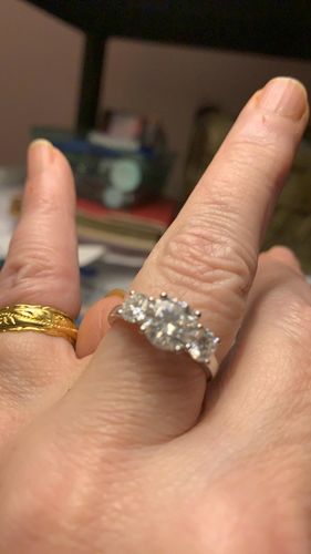 Customer photo review of Classic Three Stone Round Cut Moissanite Sterling Silver Wedding Ring
