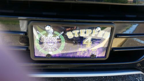 Customer photo review of Omega Psi Phi Customizable with Purple Flames Car Tag
