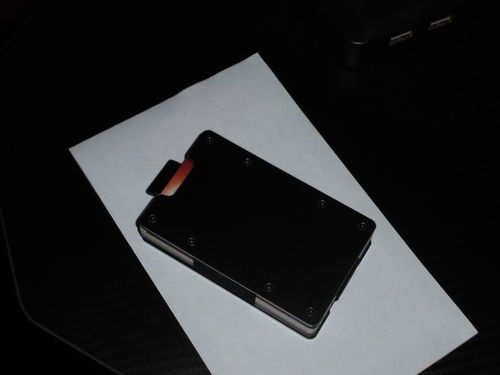 Customer photo review of Obsidian Black Aluminum Slim Wallet