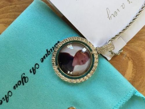 Customer photo review of THE ROTATING MEMORIES® - Custom Two-Faced Photo Pendant