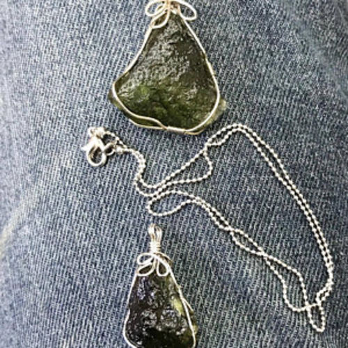 Customer photo review of Moldavite Pendant Necklace for Spiritual Awakening & Transformation.