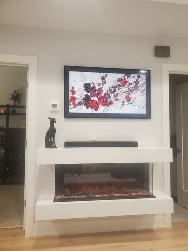 Customer photo review of Modern Flames Landscape Pro 58'' Electric Fireplace Wall Mount Studio Suite | White Ready to Paint