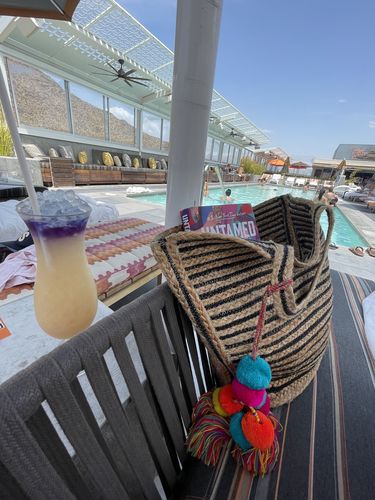 Customer photo review of Raven Stripe Eco-Friendly Tote With Pompom Tassels