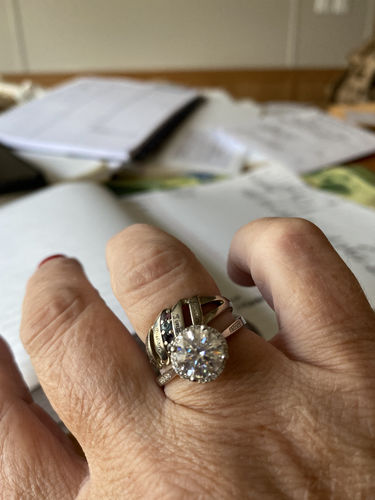 Customer photo review of Moissanite Fashion Flower Side Stone Sterling Silver Wedding Ring