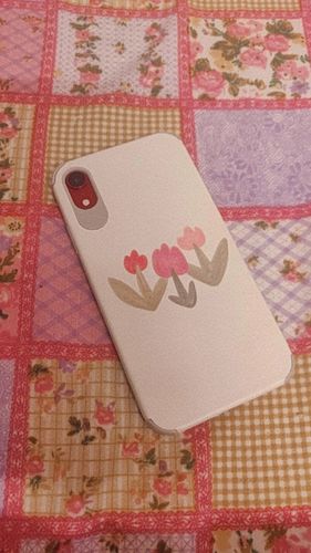 Customer photo review of Tulip Trio Leather Texture iPhone Case