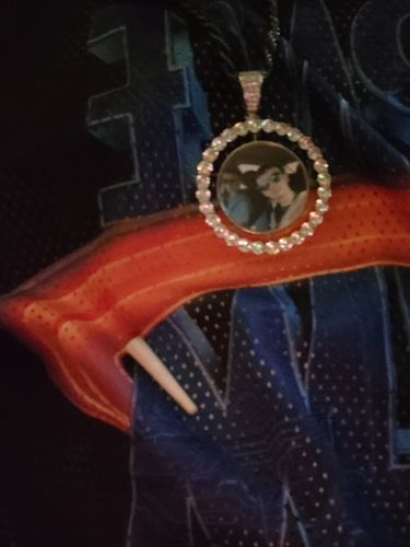 Customer photo review of THE ROTATING MEMORIES® - Custom Two-Faced Photo Pendant