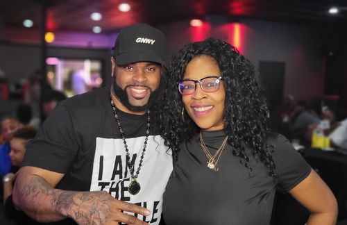 Customer photo review of I Am The Hustle Flag - Black Shirt