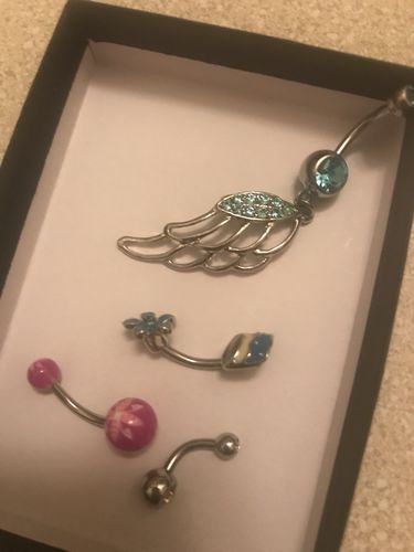 Customer photo review of 5 Piece Mystery Belly Ring Grab Bag