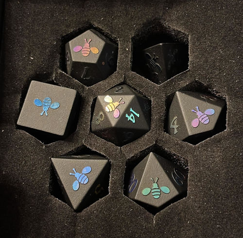 Customer photo review of Raised Holographic Obsidian Gemstone DnD Dice Set All Bees Dice