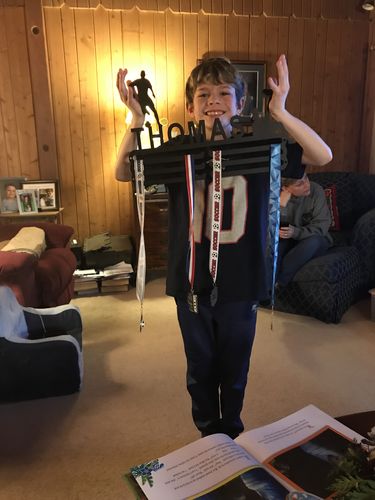 Customer photo review of Personalized Soccer Medal Hanger