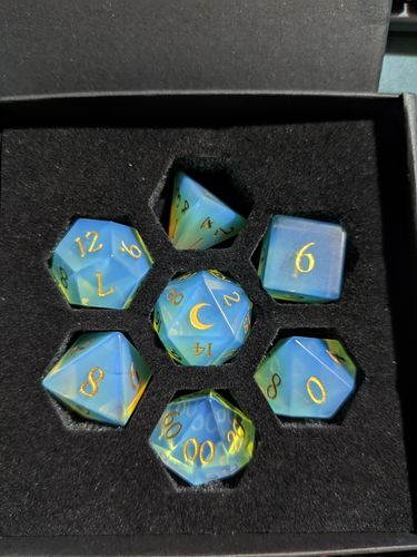 Customer photo review of Raised Fantastic Glass DnD Dice Set Moon Dice