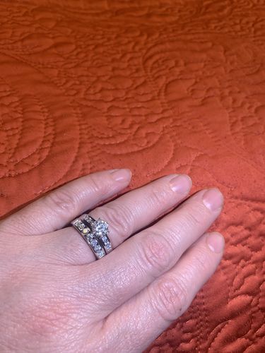 Customer photo review of Channel Set Moissanite Half Eternity Wedding Band Ring In Sterling Silver